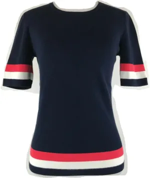 Cabi Hampton Shell Knit Top, is Navy with red and White Stripe at Sleeve and Hem.