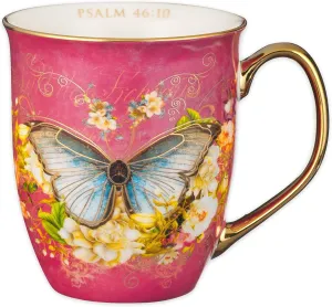 Christian Art Gifts Pink Butterfly Ceramic Coffee Mug with Gold Accents – 14 oz. Lead and Cadmium-free Inspirational Scripture Coffee and Tea Mug for Women with Bible Verse: Be Still – Psalm 46:10